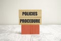 policies procedure words on wooden blocks and white background