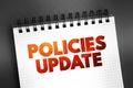 Policies Update text on notepad, concept background
