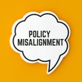 Policy misalignment concept shown in speech bubble representing conflict between rules and practice Royalty Free Stock Photo