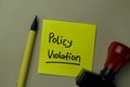 Policy Violation write on sticky notes isolated on office desk