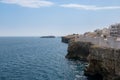 Polignano a mare breathtaking sight, Puglia, Italy. Italian panorama. Cliffs on adriatic sea and boat.