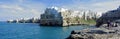 The seashore of Adriatic Sea with dramatic view of cliffs with caves rising from Adriatic sea in Polignano a Mare