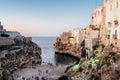 Polignano a Mare, Puglia Italy - Lama Monachile beach at sunset Royalty Free Stock Photo