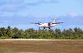 POLINESIA- JUNE 16: plane - ATR 72 Air Tahiti companies makes landing on the small tropical island Tikehau on june 16, 2011