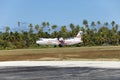 POLINESIA- JUNE 16: plane - ATR 72 Air Tahiti companies makes landing on the small tropical island Tikehau on june 16, 2011