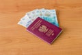 Polish biometric passport and British Currency, Pound sterling Royalty Free Stock Photo