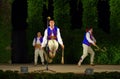 Polish dancers jump with crooks Royalty Free Stock Photo