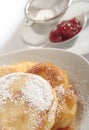 Polish doughnuts poured with icing sugar