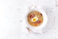 Polish Easter Soup made with Ray Flour, Egg and sausage Royalty Free Stock Photo