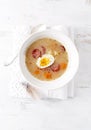 Polish Easter Soup made with Ray Flour, Egg and sausage Royalty Free Stock Photo