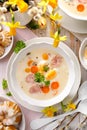 Polish Easter soup, white borscht with the addition of white sausage and a hard boiled egg. Traditional Easter dish in Poland Royalty Free Stock Photo