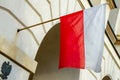 Polish flag on a building in central Warsaw in Poland Royalty Free Stock Photo