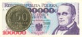 50 polish groszy coin against 100000 polish zloty bank note Royalty Free Stock Photo