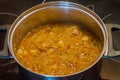 Polish kapusniak soup in pot.