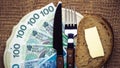 Polish money on kitchen table, coast of living Royalty Free Stock Photo