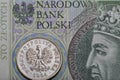 Polish one hundred zloty bill and coin macro Royalty Free Stock Photo