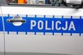 Polish police sign on a door of police car Royalty Free Stock Photo