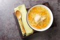 Polish Rosol z kury chicken soup with vermicelli and vegetables close-up in a bowl on a wooden tray. horizontal top view Royalty Free Stock Photo
