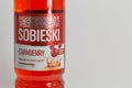 Polish Sobieski Cranberry vodka bottle label closeup against white bacground