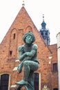 A statue at St. Barbara church in Main Square of Krakow, Poland