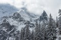 Winter Tatra Mountains with snowy trees and frozen Mnich (Monk) rocky mountain