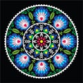 Polish traditional folk art pattern in circle - Wzory Lowickie on black Royalty Free Stock Photo
