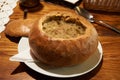 Polish traditional soup Zurek in bread, selective focus Royalty Free Stock Photo