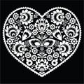 Polish white folk art heart pattern on black - wzory lowickie, wycinanka Royalty Free Stock Photo