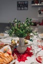 Christmas Eve's red borscht soup with mushroom filled ravioli and beet chips and sauerkraut with mushrooms on Royalty Free Stock Photo