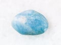 polished aquamarine gem stone on white