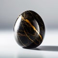 polished black marble with intricate gold veins that catch the light