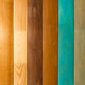 Polished Board. Different types of wood. White oak. Bog oak. Light walnut. Green, yellow, brown.