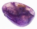 polished charoite (charoitite) cabochon on white