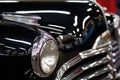 polished chrome details on a fully restored classic car