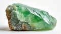 Polished Chrysoprase gem, showcasing its translucent green beauty, on a seamless white background.