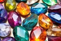 polished gemstones reflecting rainbow hues