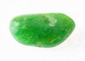 polished green agate (chalcedony) stone on white