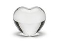 Polished heart-shaped object on white background Royalty Free Stock Photo