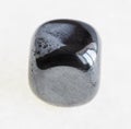 polished hematite (haematite) gem stone on white