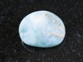 polished Larimar gemstone on dark background Royalty Free Stock Photo