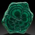 A polished malachite specimen featuring concentric circular patterns in varying Royalty Free Stock Photo