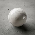 Marble sphere with a smooth surface and subtle veining pattern Royalty Free Stock Photo