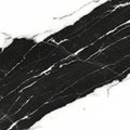 Polished marble surface featuring contrasting black and white sections. The diagona Royalty Free Stock Photo