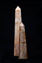 Polished multicolor carved onyx obelisk