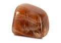 Polished peach moonstone gem, isolated on white background Royalty Free Stock Photo