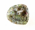 polished Peridot ( olivine) crystals in stone Royalty Free Stock Photo