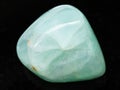 polished Prehnite gemstone on dark background Royalty Free Stock Photo