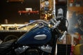 Polished, refurbished biker motorcycle in garage workshop