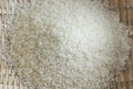 Polished rice in a bamboo basket Royalty Free Stock Photo