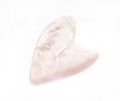 polished rose quartz stone in heart shape on white Royalty Free Stock Photo